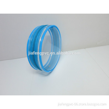 Round TPU cosmetic pouch with blue piping